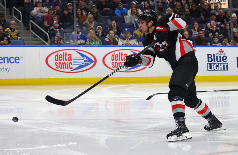 Mar 2, 2024; Buffalo, New York, USA;  Buffalo Sabres center Dylan Cozens (24) takes a shot on goal and scores during the second period against the Vegas Golden Knights at KeyBank Center. Mandatory Credit: Timothy T. Ludwig-USA TODAY Sports