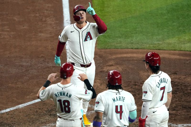 Jun 13, 2024; Phoenix, Arizona, USA; Arizona Diamondbacks designated hitter Joc Pederson (3) celebrates after hitting a grand slam home run against the Los Angeles Angels during the seventh inning at Chase Field. Mandatory Credit: Joe Camporeale-USA TODAY Sports