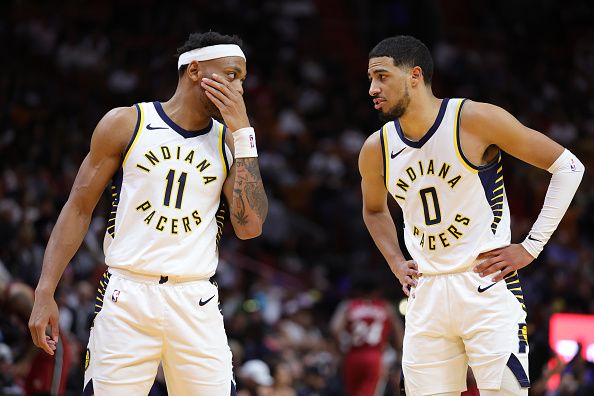 MIAMI, FLORIDA - NOVEMBER 30: Bruce Brown #11 and Tyrese Haliburton #0 of the Indiana Pacers speak on the court during the third quarter of the game against the Miami Heat at Kaseya Center on November 30, 2023 in Miami, Florida. NOTE TO USER: User expressly acknowledges and agrees that, by downloading and or using this photograph, User is consenting to the terms and conditions of the Getty Images License Agreement. (Photo by Megan Briggs/Getty Images)