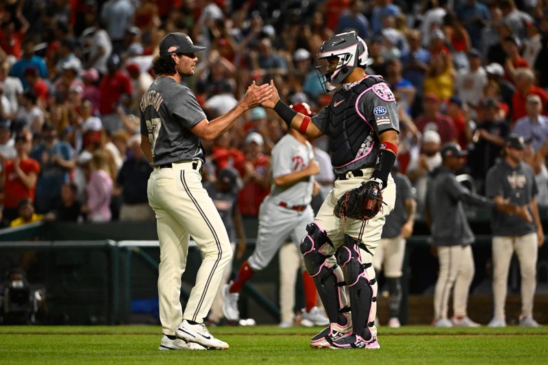 Aug 18, 2023; Washington, District of Columbia, USA; Washington Nationals relief pitcher Kyle Finnegan (67) is congratulated by catcher Keibert Ruiz (20) after earning a save against the Philadelphia Phillies at Nationals Park. Mandatory Credit: Brad Mills-USA TODAY Sports