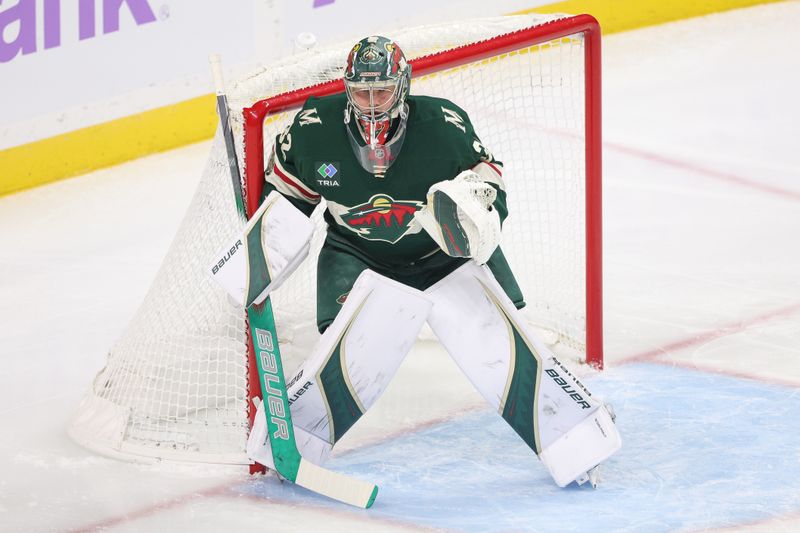 Nov 16, 2025; Saint Paul, Minnesota, USA; Minnesota Wild goaltender Filip Gustavsson (32) defends his net against the Vegas Golden Knights during the first period at Grand Casino Arena. Mandatory Credit: Matt Krohn-Imagn Images