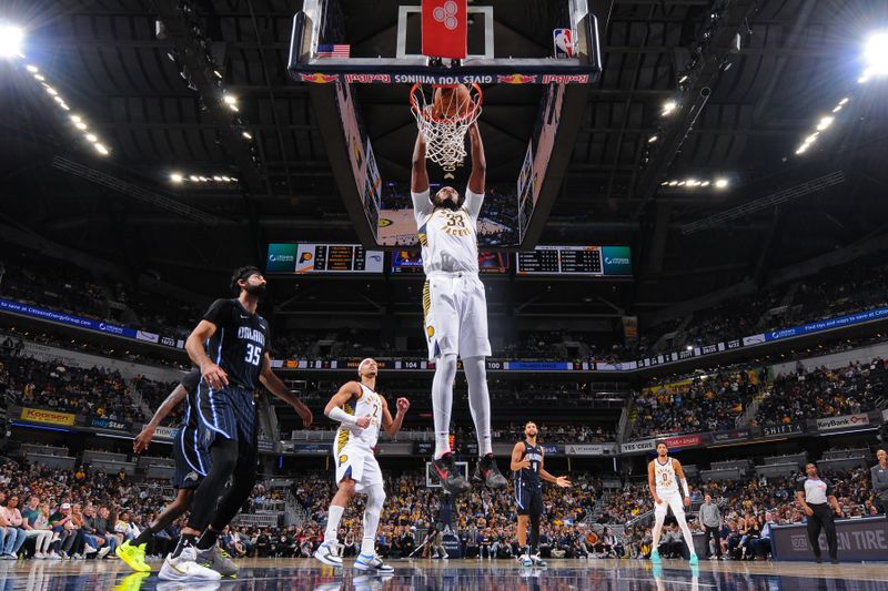 INDIANAPOLIS, IN - NOVEMBER 6: Myles Turner #33 of the Indiana Pacers dunks the ball during the game against the Orlando Magic on November 6, 2024 at Gainbridge Fieldhouse in Indianapolis, Indiana. NOTE TO USER: User expressly acknowledges and agrees that, by downloading and or using this Photograph, user is consenting to the terms and conditions of the Getty Images License Agreement. Mandatory Copyright Notice: Copyright 2024 NBAE (Photo by Ron Hoskins/NBAE via Getty Images)