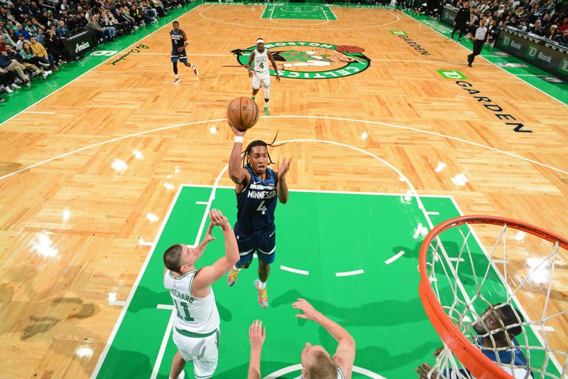 BOSTON, MA - NOVEMBER 24: Rob Dillingham #4 of the Minnesota Timberwolves shoots the ball during the game against the Boston Celtics on November 24, 2024 at the TD Garden in Boston, Massachusetts. NOTE TO USER: User expressly acknowledges and agrees that, by downloading and or using this photograph, User is consenting to the terms and conditions of the Getty Images License Agreement. Mandatory Copyright Notice: Copyright 2024 NBAE(Photo by Brian Babineau/NBAE via Getty Images)