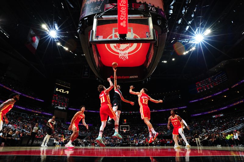 ATLANTA, GA - MARCH 3: Shaedon Sharpe #17 of the Portland Trail Blazers drives to the basket during the game against the Atlanta Hawks on March 3, 2023 at State Farm Arena in Atlanta, Georgia.  NOTE TO USER: User expressly acknowledges and agrees that, by downloading and/or using this Photograph, user is consenting to the terms and conditions of the Getty Images License Agreement. Mandatory Copyright Notice: Copyright 2023 NBAE (Photo by Scott Cunningham/NBAE via Getty Images)