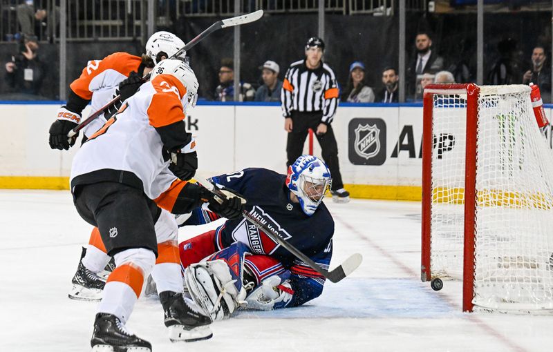 Apr 9, 2025; New York, New York, USA;  Philadelphia Flyers left wing Jakob Pelletier (22) scores a goal against New York Rangers goaltender Jonathan Quick (32) during the third period at Madison Square Garden. Mandatory Credit: Dennis Schneidler-Imagn Images