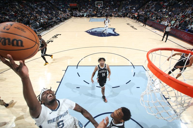 MEMPHIS, TN - February 26:  Vince Williams Jr. #5 of the Memphis Grizzlies drives to the basket during the game against the Brooklyn Nets on February 26, 2024 at FedExForum in Memphis, Tennessee. NOTE TO USER: User expressly acknowledges and agrees that, by downloading and or using this photograph, User is consenting to the terms and conditions of the Getty Images License Agreement. Mandatory Copyright Notice: Copyright 2024 NBAE (Photo by Joe Murphy/NBAE via Getty Images)