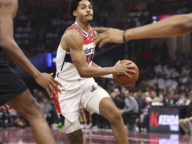 CLEVELAND, OH - DECEMBER 3: Jordan Poole #13 of the Washington Wizards drives to the basket during the game against the Cleveland Cavaliers in the NBA Cup on December 3, 2024 at Rocket Mortgage FieldHouse in Cleveland, Ohio. NOTE TO USER: User expressly acknowledges and agrees that, by downloading and/or using this Photograph, user is consenting to the terms and conditions of the Getty Images License Agreement. Mandatory Copyright Notice: Copyright 2024 NBAE (Photo by  Lauren Leigh Bacho/NBAE via Getty Images)