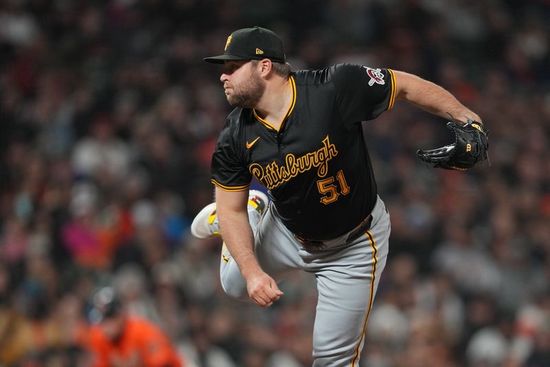 Apr 26, 2024; San Francisco, California, USA; Pittsburgh Pirates pitcher David Bednar (51) throws a pitch against the San Francisco Giants during the ninth inning at Oracle Park. Mandatory Credit: Darren Yamashita-USA TODAY Sports