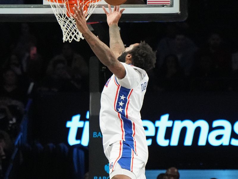 BROOKLYN, NY - FEBRUARY 12: Andre Drummond #1 of the Philadelphia 76ers drives to the basket during the game against the Brooklyn Nets on February 12, 2025 at Barclays Center in Brooklyn, New York. NOTE TO USER: User expressly acknowledges and agrees that, by downloading and or using this Photograph, user is consenting to the terms and conditions of the Getty Images License Agreement. Mandatory Copyright Notice: Copyright 2025 NBAE (Photo by Jesse D. Garrabrant/NBAE via Getty Images)