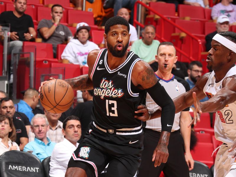 MIAMI, FL - DECEMBER 8: Paul George #13 of the LA Clippers dribbles the ball during the game against the Miami Heat on December 8, 2022 at FTX Arena in Miami, Florida. NOTE TO USER: User expressly acknowledges and agrees that, by downloading and or using this Photograph, user is consenting to the terms and conditions of the Getty Images License Agreement. Mandatory Copyright Notice: Copyright 2022 NBAE (Photo by Issac Baldizon/NBAE via Getty Images)