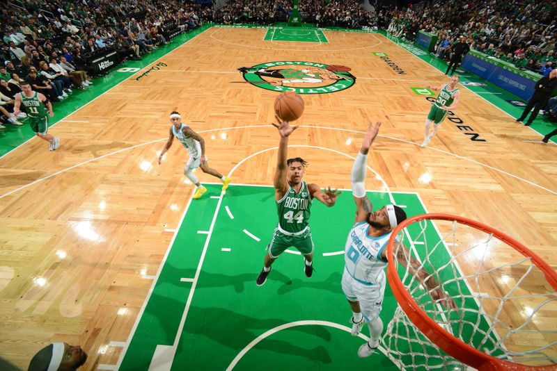 BOSTON, MA - APRIL 12:  Jaden Springer #44 of the Boston Celtics drives to the basket during the game against the Charlotte Hornets on April 12, 2024 at the TD Garden in Boston, Massachusetts. NOTE TO USER: User expressly acknowledges and agrees that, by downloading and or using this photograph, User is consenting to the terms and conditions of the Getty Images License Agreement. Mandatory Copyright Notice: Copyright 2024 NBAE  (Photo by Brian Babineau/NBAE via Getty Images)