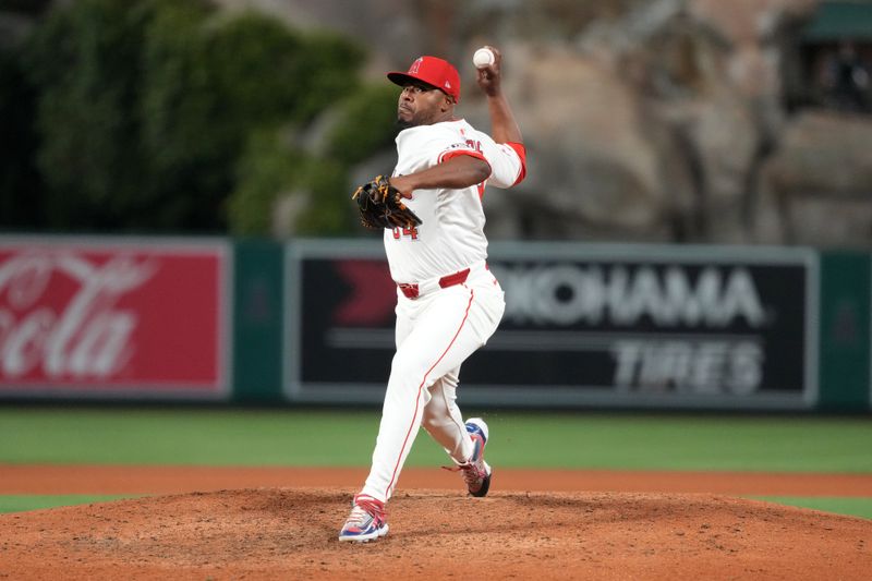 May 9, 2025; Anaheim, California, USA; Los Angeles Angels relief pitcher Hector Neris (54) throws in the seventh inning against the Baltimore Orioles at Angel Stadium. Mandatory Credit: Kirby Lee-Imagn Images