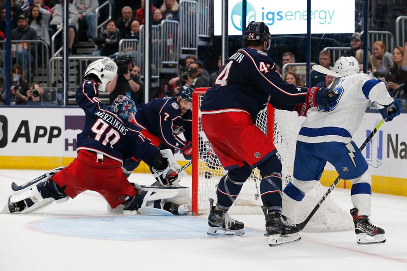 Feb 10, 2024; Columbus, Ohio, USA; Columbus Blue Jackets goalie Elvis Merzlikins (90) makes a save against the Tampa Bay Lightning during the third period at Nationwide Arena. Mandatory Credit: Russell LaBounty-USA TODAY Sports