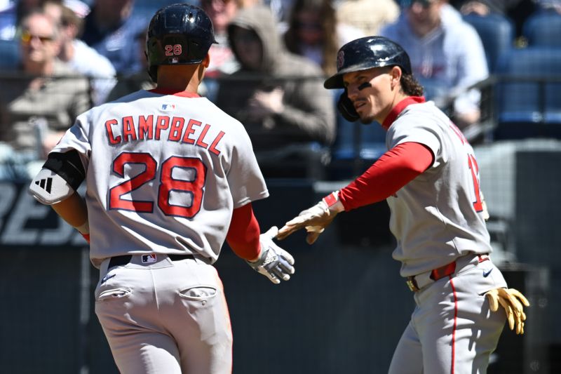 Apr 27, 2025; Cleveland, Ohio, USA; Boston Red Sox second baseman Kristian Campbell (28) celebrates with left fielder Jarren Duran (16) after scoring during the fourth inning against the Cleveland Guardians at Progressive Field. Mandatory Credit: Ken Blaze-Imagn Images