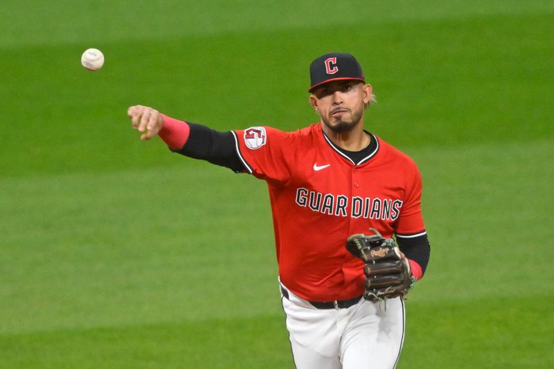 Apr 29, 2025; Cleveland, Ohio, USA; Cleveland Guardians shortstop Gabriel Arias (13) throws to first base in the third inning against the Minnesota Twins at Progressive Field. Mandatory Credit: David Richard-Imagn Images