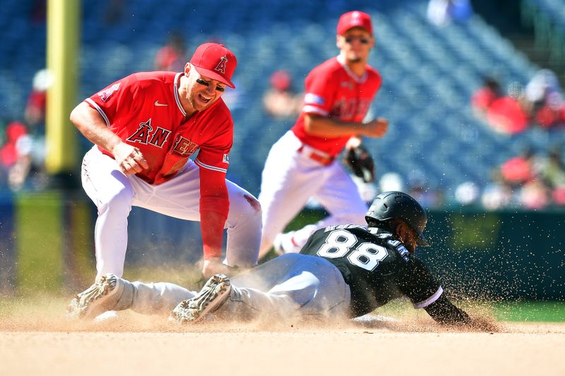 Jun 29, 2023; Anaheim, California, USA; Chicago White Sox center fielder Luis Robert Jr. (88) steals second against Los Angeles Angels right fielder Hunter Renfroe (12) during the ninth inning at Angel Stadium. Mandatory Credit: Gary A. Vasquez-USA TODAY Sports