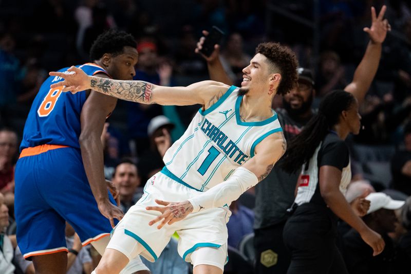 CHARLOTTE, NORTH CAROLINA - OCTOBER 06: LaMelo Ball #1 of the Charlotte Hornets reacts after making a shot in the second quarter during a preseason game against the New York Knicks at Spectrum Center on October 06, 2024 in Charlotte, North Carolina. NOTE TO USER: User expressly acknowledges and agrees that, by downloading and or using this photograph, User is consenting to the terms and conditions of the Getty Images License Agreement. (Photo by Jacob Kupferman/Getty Images)