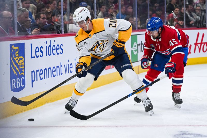 Oct 16, 2025; Montreal, Quebec, CAN; Montreal Canadiens defenseman Alexandre Carrier (45) defends against Nashville Predators defenseman Justin Barron (20) during the first period at Bell Centre. Mandatory Credit: David Kirouac-Imagn Images