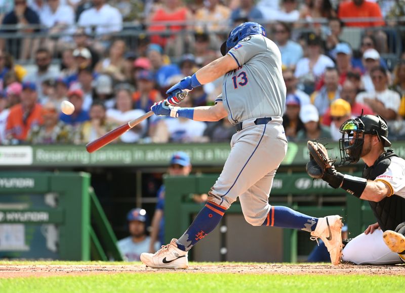 Jul 6, 2024; Pittsburgh, Pennsylvania, USA;  New York Mets batter Luis Torrens (13) hits a bases loaded double in the third inning  against the Pittsburgh Pirates at PNC Park. Mandatory Credit: Philip G. Pavely-USA TODAY Sports