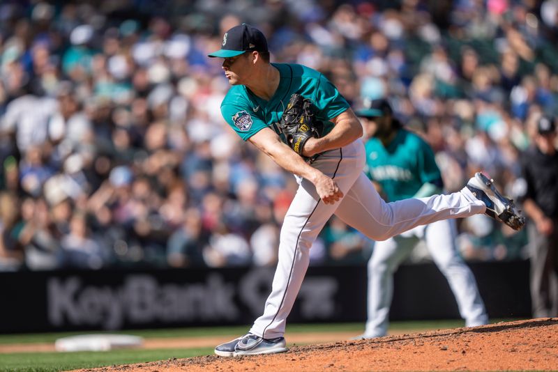 Sep 13, 2023; Seattle, Washington, USA; Seattle Mariners reliever Justin Topa (48) delivers a pitch during the seventh inning against the Los Angeles Angels at T-Mobile Park. Mandatory Credit: Stephen Brashear-USA TODAY Sports