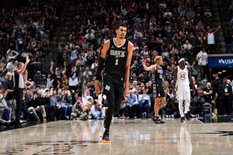 HOUSTON, TX - MARCH 3: Victor Wembanyama #1 of the San Antonio Spurs celebrates during the game against the Indiana Pacers on March 3, 2024 at the Toyota Center in Houston, Texas. NOTE TO USER: User expressly acknowledges and agrees that, by downloading and or using this photograph, User is consenting to the terms and conditions of the Getty Images License Agreement. Mandatory Copyright Notice: Copyright 2024 NBAE (Photo by Logan Riely/NBAE via Getty Images)