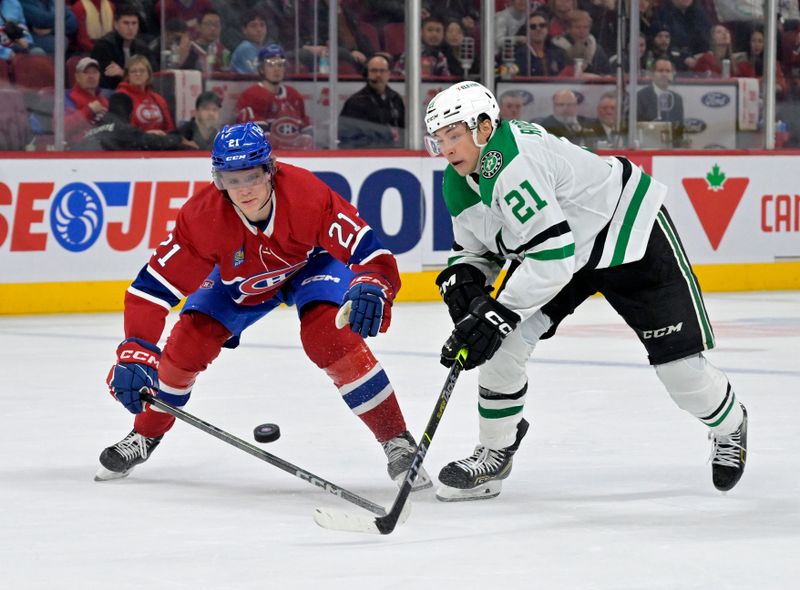 Feb 10, 2024; Montreal, Quebec, CAN; Montreal Canadiens defenseman Kaiden Guhle (21) and Dallas Stars forward Jason Robertson (21) battle for the puck during the third period at the Bell Centre. Mandatory Credit: Eric Bolte-USA TODAY Sports