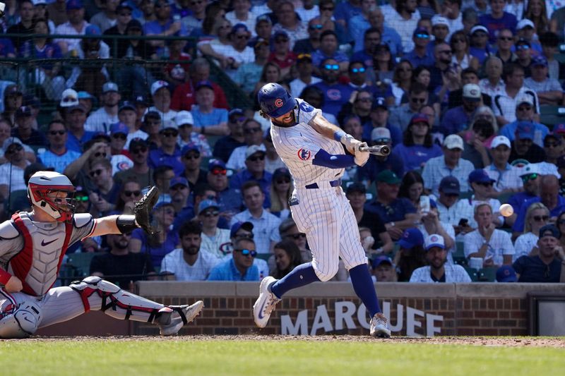 Aug 7, 2024; Chicago, Illinois, USA; Chicago Cubs shortstop Dansby Swanson (7) hits a one run single against the Minnesota Twins during the seventh inning  at Wrigley Field. Mandatory Credit: David Banks-USA TODAY Sports