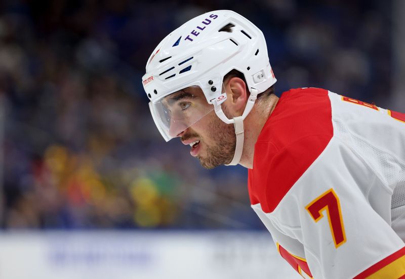 Nov 9, 2024; Buffalo, New York, USA;  Calgary Flames defenseman Kevin Bahl (7) waits for the face-off during the first period against the Buffalo Sabres at KeyBank Center. Mandatory Credit: Timothy T. Ludwig-Imagn Images