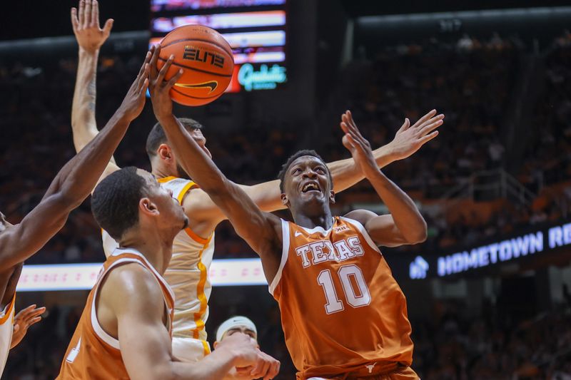 Jan 28, 2023; Knoxville, Tennessee, USA; Texas Longhorns guard Sir'Jabari Rice (10) goes to the basket against the Tennessee Volunteers during the first half at Thompson-Boling Arena. Mandatory Credit: Randy Sartin-USA TODAY Sports