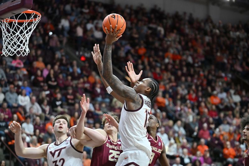 Feb 14, 2026; Blacksburg, Virginia, USA;  Virginia Tech Hokies forward Amani Hansberry (13) shoots against the Florida State Seminoles during the second half at Cassell Coliseum. Mandatory Credit: Brian Bishop-Imagn Images