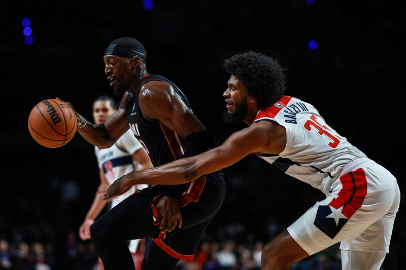 MEXICO CITY, MEXICO - NOVEMBER 02: Bam Adebayo #13 of the Miami Heat dribbles against Marvin Bagley III #35 of the Washington Wizards during the second half of the game at Arena Ciudad de Mexico on November 02, 2024 in Mexico City, Mexico. NOTE TO USER: User expressly acknowledges and agrees that, by downloading and or using this photograph, User is consenting to the terms and conditions of the Getty Images License Agreement. (Photo by Manuel Velasquez/Getty Images)