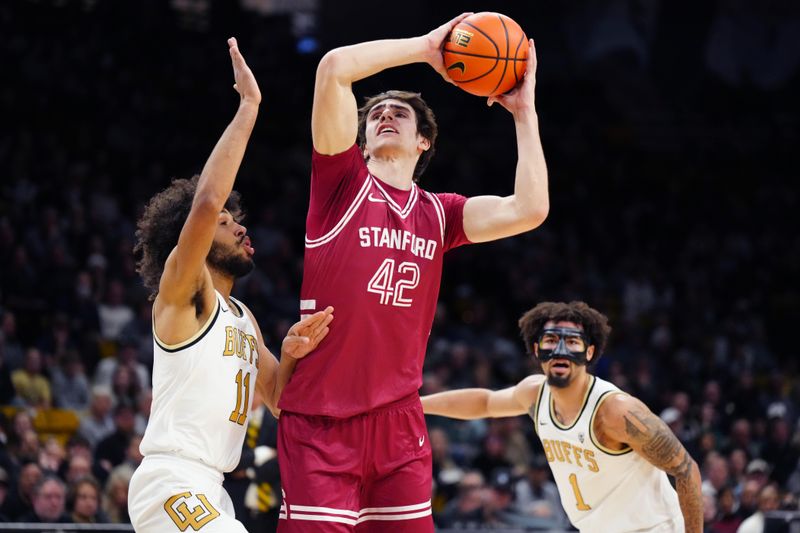 Mar 3, 2024; Boulder, Colorado, USA; Stanford Cardinal forward Maxime Raynaud (42) shoots over Colorado Buffaloes guard Javon Ruffin (11) in the first half at the CU Events Center. Mandatory Credit: Ron Chenoy-USA TODAY Sports