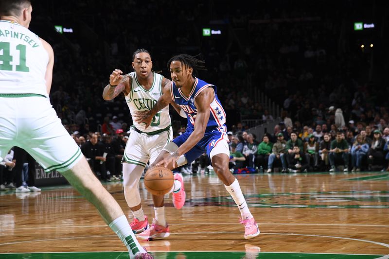 BOSTON, MA - OCTOBER 12: Judah Mintz #33 of the Philadelphia 76ers handles the ball during the game against the Boston Celtics during a NBA Preseason game on October 12, 2024 at TD Garden in Boston, Massachusetts. NOTE TO USER: User expressly acknowledges and agrees that, by downloading and/or using this Photograph, user is consenting to the terms and conditions of the Getty Images License Agreement. Mandatory Copyright Notice: Copyright 2024 NBAE (Photo by Brian Babineau/NBAE via Getty Images)