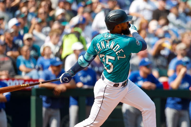 Aug 28, 2023; Seattle, Washington, USA; Seattle Mariners right fielder Teoscar Hernandez (35) hits grand slam home run against the Kansas City Royals during the third inning at T-Mobile Park. Mandatory Credit: Joe Nicholson-USA TODAY Sports