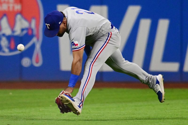 Sep 15, 2023; Cleveland, Ohio, USA; Texas Rangers left fielder Ezequiel Duran (21) can not make the catch of an RBI double hit by Cleveland Guardians first baseman Josh Naylor (not pictured) during the sixth inning at Progressive Field. Mandatory Credit: Ken Blaze-USA TODAY Sports