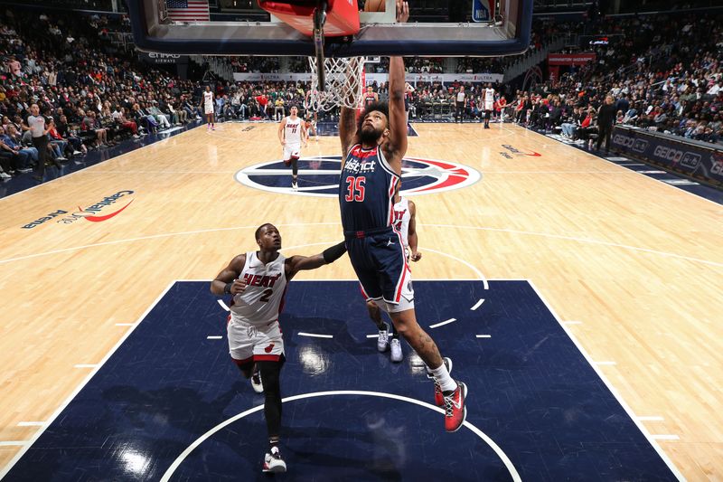 WASHINGTON, DC -? MARCH 31: Marvin Bagley III #35 of the Washington Wizards dunks the ball during the game against the Miami Heat on March 31, 2024 at Capital One Arena in Washington, DC. NOTE TO USER: User expressly acknowledges and agrees that, by downloading and or using this Photograph, user is consenting to the terms and conditions of the Getty Images License Agreement. Mandatory Copyright Notice: Copyright 2024 NBAE (Photo by Stephen Gosling/NBAE via Getty Images)