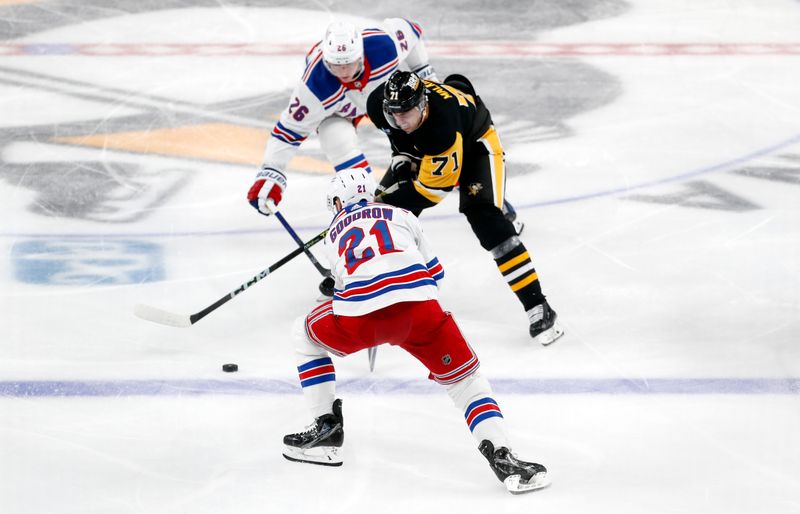 Nov 22, 2023; Pittsburgh, Pennsylvania, USA; Pittsburgh Penguins center Evgeni Malkin (71) moves the puck between New York Rangers left wing Jimmy Vesey (26) and center Barclay Goodrow (21) during the third period at PPG Paints Arena. The Rangers won 1-0. Mandatory Credit: Charles LeClaire-USA TODAY Sports