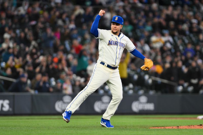 Apr 16, 2023; Seattle, Washington, USA; Seattle Mariners starting pitcher Luis Castillo (58) celebrates after the final out of the seventh inning against the Colorado Rockies at T-Mobile Park. Mandatory Credit: Steven Bisig-USA TODAY Sports