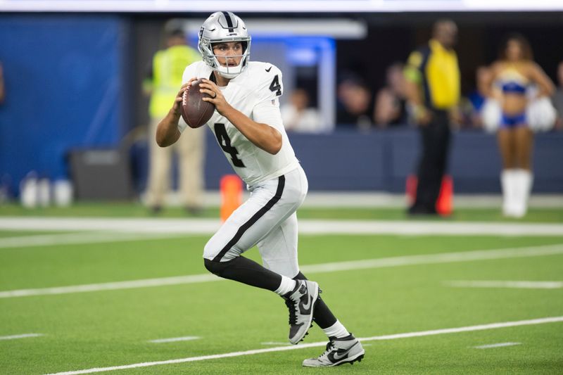 Las Vegas Raiders quarterback Aidan O'Connell (4) throws a pass during an NFL preseason football game against the Los Angeles Rams, Saturday, Aug. 19, 2023, in Inglewood, Calif. (AP Photo/Kyusung Gong)