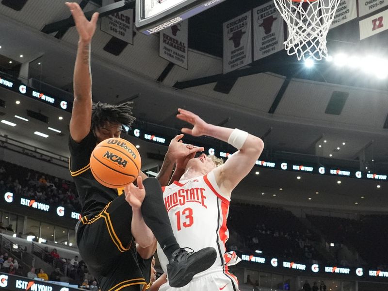 Mar 12, 2026; Chicago, IL, USA; Iowa Hawkeyes guard Tavion Banks (6) and Ohio State Buckeyes center Christoph Tilly (13) do for a rebound during the first half at United Center. Mandatory Credit: David Banks-Imagn Images