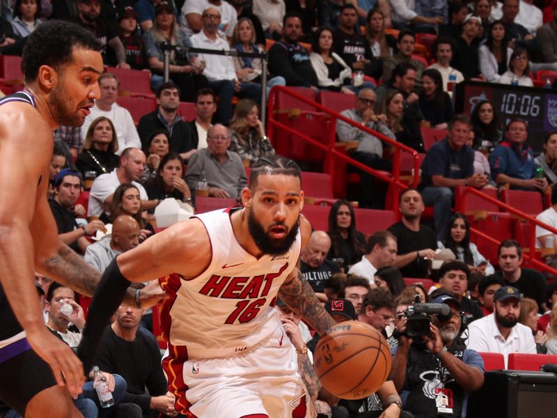 MIAMI, FL - JANUARY 31: Caleb Martin #16 of the Miami Heat handles the ball during the game  against the Sacramento Kings on January 31, 2024 at Kaseya Center in Miami, Florida. NOTE TO USER: User expressly acknowledges and agrees that, by downloading and or using this Photograph, user is consenting to the terms and conditions of the Getty Images License Agreement. Mandatory Copyright Notice: Copyright 2024 NBAE (Photo by Issac Baldizon/NBAE via Getty Images)