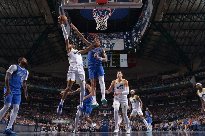 DALLAS, TX - OCTOBER 28: Cody Williams #5 of the Utah Jazz drives to the basket during the game drives to the basket during the game against the Dallas Mavericks on October 28, 2024 at American Airlines Center in Dallas, Texas. NOTE TO USER: User expressly acknowledges and agrees that, by downloading and or using this photograph, User is consenting to the terms and conditions of the Getty Images License Agreement. Mandatory Copyright Notice: Copyright 2024 NBAE (Photo by Glenn James/NBAE via Getty Images)