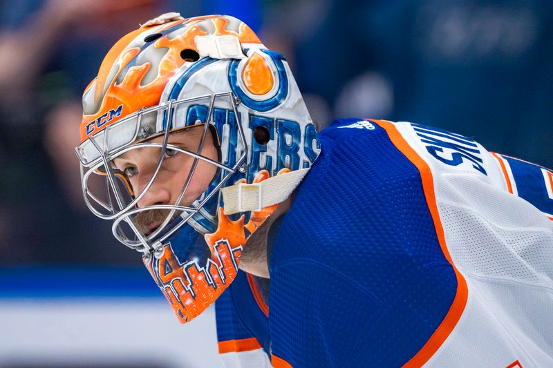 May 20, 2024; Vancouver, British Columbia, CAN; Edmonton Oilers goalie Stuart Skinner (74) rests in warm up prior to game seven of the second round of the 2024 Stanley Cup Playoffs against the Vancouver Canucks at Rogers Arena. Mandatory Credit: Bob Frid-USA TODAY Sports