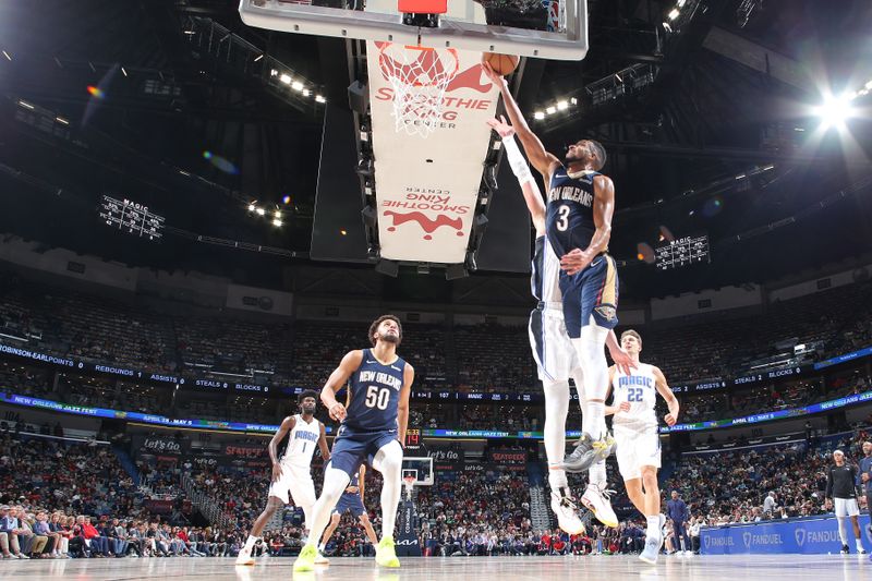 NEW ORLEANS, LA - APRIL 3:  CJ McCollum #3 of the New Orleans Pelicans drives to the basket during the game against the Orlando Magic on April 3, 2024 at the Smoothie King Center in New Orleans, Louisiana. NOTE TO USER: User expressly acknowledges and agrees that, by downloading and or using this Photograph, user is consenting to the terms and conditions of the Getty Images License Agreement. Mandatory Copyright Notice: Copyright 2024 NBAE (Photo by Layne Murdoch Jr./NBAE via Getty Images)