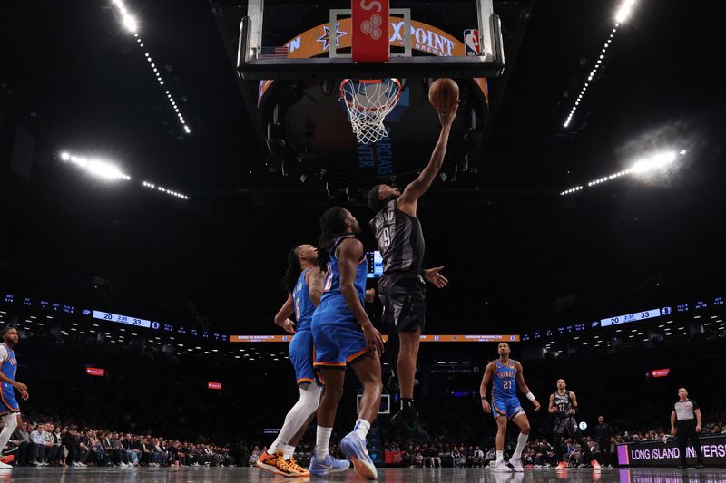 BROOKLYN, NY - FEBRUARY 26:  Trendon Watford #9 of the Brooklyn Nets drives to the basket during the game against the Oklahoma City Thunder on February 26, 2025 at Barclays Center in Brooklyn, New York. NOTE TO USER: User expressly acknowledges and agrees that, by downloading and or using this Photograph, user is consenting to the terms and conditions of the Getty Images License Agreement. Mandatory Copyright Notice: Copyright 2025 NBAE (Photo by Brandon Todd/NBAE via Getty Images)