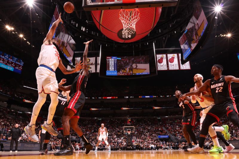 MIAMI, FL - OCTOBER 30: Karl-Anthony Towns #32 of the New York Knicks shoots the ball during the game against the Miami Heat on October 30, 2024 at Kaseya Center in Miami, Florida. NOTE TO USER: User expressly acknowledges and agrees that, by downloading and or using this Photograph, user is consenting to the terms and conditions of the Getty Images License Agreement. Mandatory Copyright Notice: Copyright 2024 NBAE (Photo by Issac Baldizon/NBAE via Getty Images)