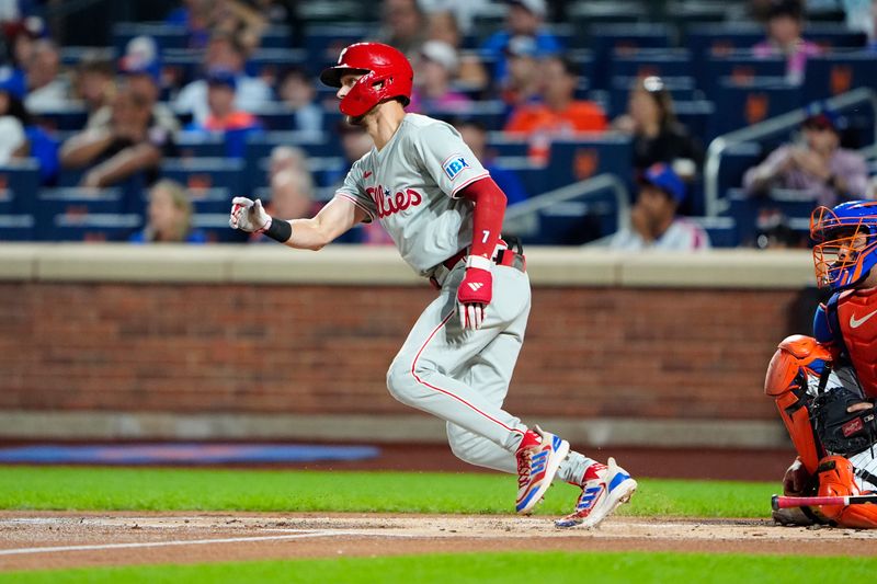 Sep 22, 2024; New York City, New York, USA;  Philadelphia Phillies shortstop Trea Turner (7) runs out a single against the New York Mets during the first inning at Citi Field. Mandatory Credit: Gregory Fisher-Imagn Images