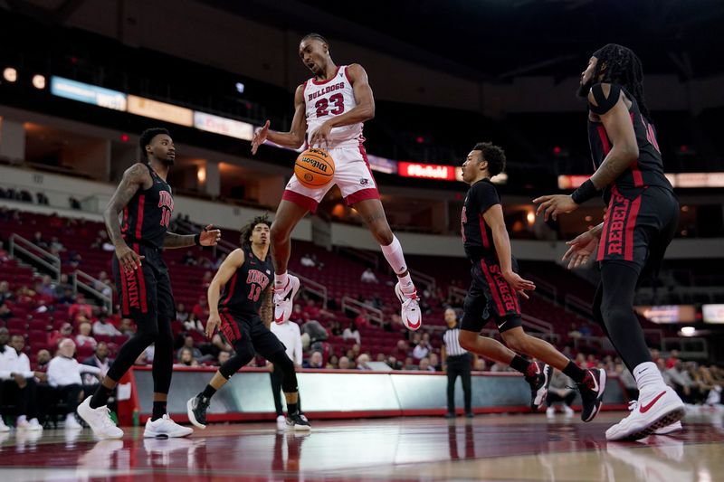 Feb 14, 2024; Fresno, California, USA; Fresno State Bulldogs guard Leo Colimerio (23) has the ball knocked out of his hands by UNLV Rebels guard Dedan Thomas Jr. (11) in the second half at the Save Mart Center. Mandatory Credit: Cary Edmondson-USA TODAY Sports