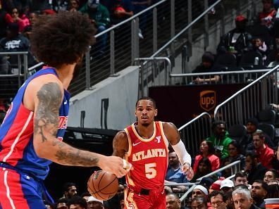 ATLANTA, GA - DECEMBER 18: Dejounte Murray #5 of the Atlanta Hawks handles the ball during the game  on December 18, 2023 at State Farm Arena in Atlanta, Georgia.  NOTE TO USER: User expressly acknowledges and agrees that, by downloading and/or using this Photograph, user is consenting to the terms and conditions of the Getty Images License Agreement. Mandatory Copyright Notice: Copyright 2023 NBAE (Photo by Scott Cunningham/NBAE via Getty Images)