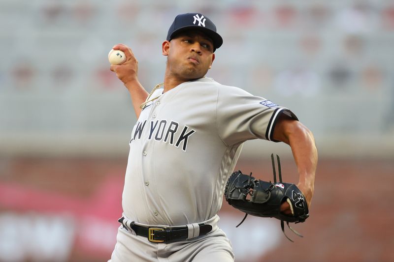 Aug 16, 2023; Atlanta, Georgia, USA; New York Yankees starting pitcher Randy Vasquez (98) throws against the Atlanta Braves in the second inning at Truist Park. Mandatory Credit: Brett Davis-USA TODAY Sports